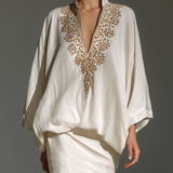 Set elegant din două piese, bluză și fustă mini albă