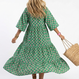 FIORA | ROCHIE MIDI TIERATĂ CU DECOLTEU ÎN FORMĂ DE V ȘI PRINT FLORAL