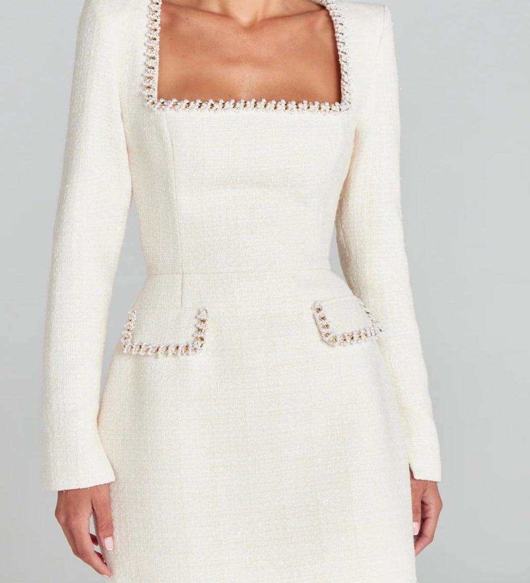 Rochie mini cu buzunare și accente din perle